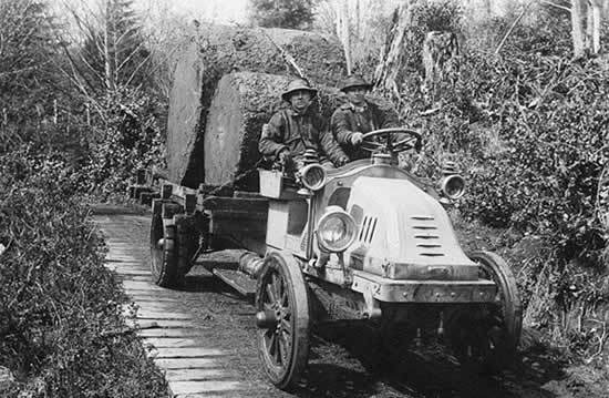 Figure 1.2. Early loggers hauling peeler blocks with a Kelley-Springfield truck on a “cross-plank” road in Pacific County (Pacific County Historical Society and Museum).